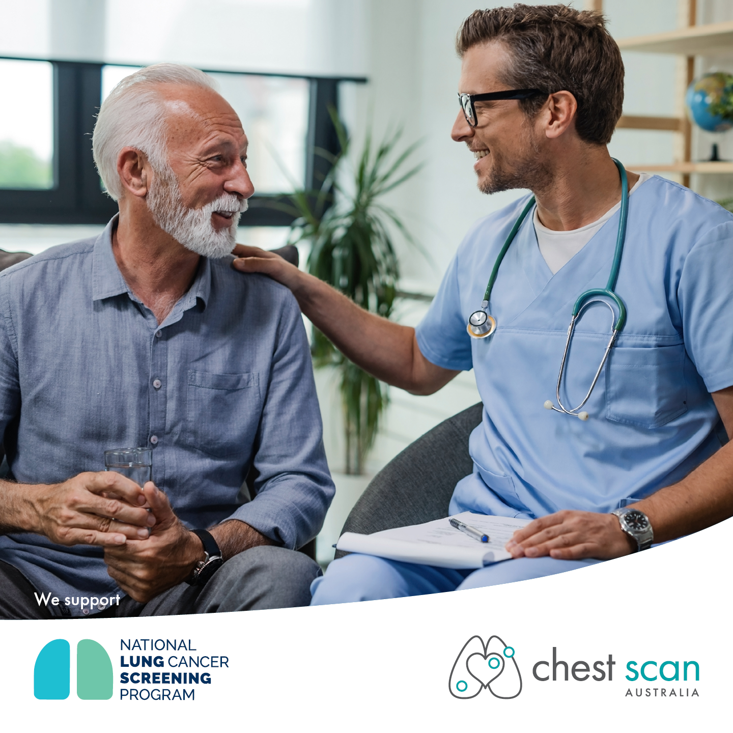 Two gentlemen sitting next to eachother, one a male patient, one a male dr who has his hand on the patient shoulder holding a clipboard
